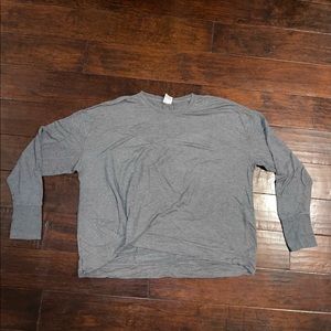 Grey, long sleeve active wear top. Thumb holes in the sleeve. Woman’s XXL
